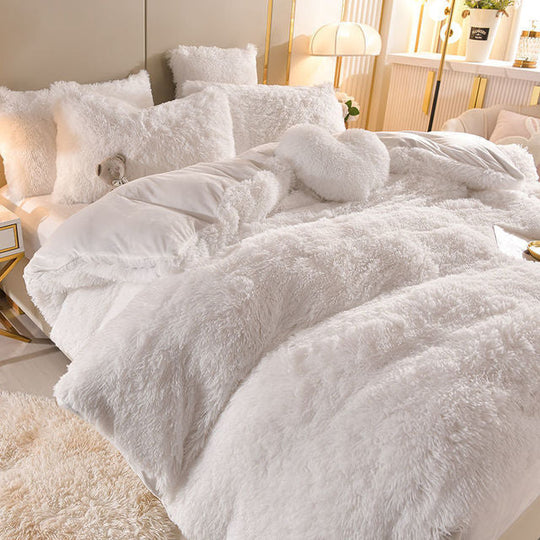 Sueños de peluche - 4 juegos de ropa de cama de forro polar + cojín en forma de corazón