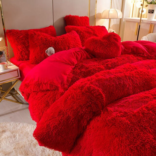 Sueños de peluche - 4 juegos de ropa de cama de forro polar + cojín en forma de corazón