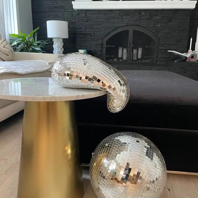 Schmelzende Discokugel Wanddekoration